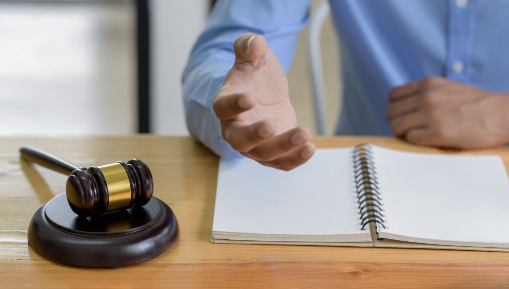 close up shot of hammer on the table and lawyer in 2023 11 27 05 00 29 utc 1024x582 1