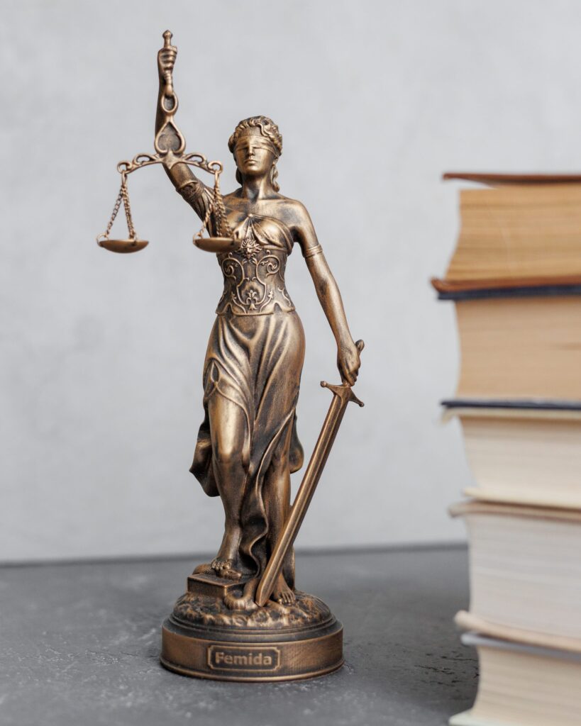 themis goddess of justice statuette symbol of law 2023 11 27 05 00 28 utc scaled 1